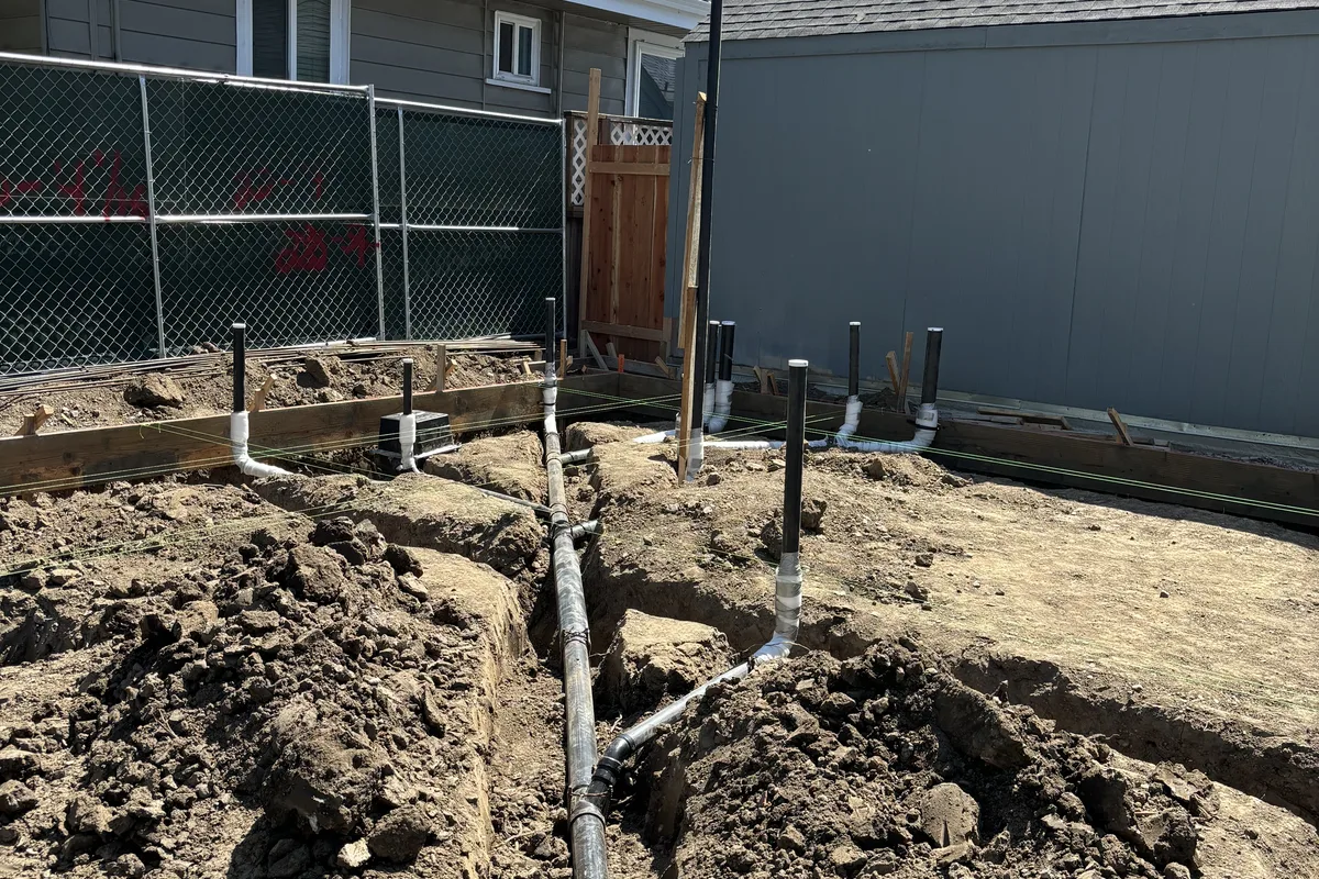 Damaged sewer section excavated and replaced at a Hollister-area home by the DAE Plumbing crew.